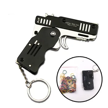 Všetky kovové mini môžu byť zložené ako krúžok na kľúče gumička zbraň detí darček hračka šiestich zväzkoch gumová hračka pištoľ hračka zbraň